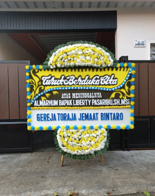 Papan Bunga Duka di Kayo
